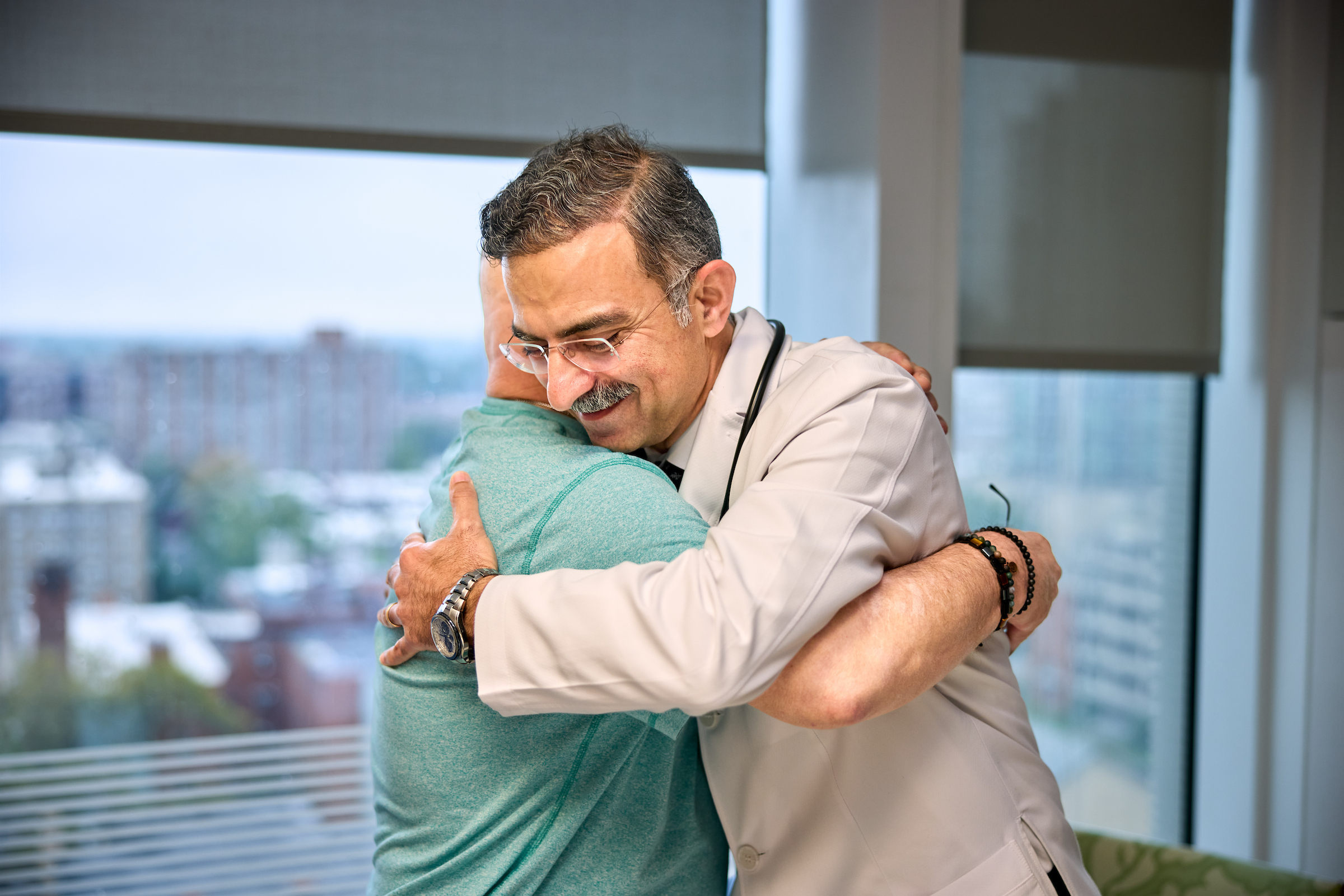 doctor and patient hug