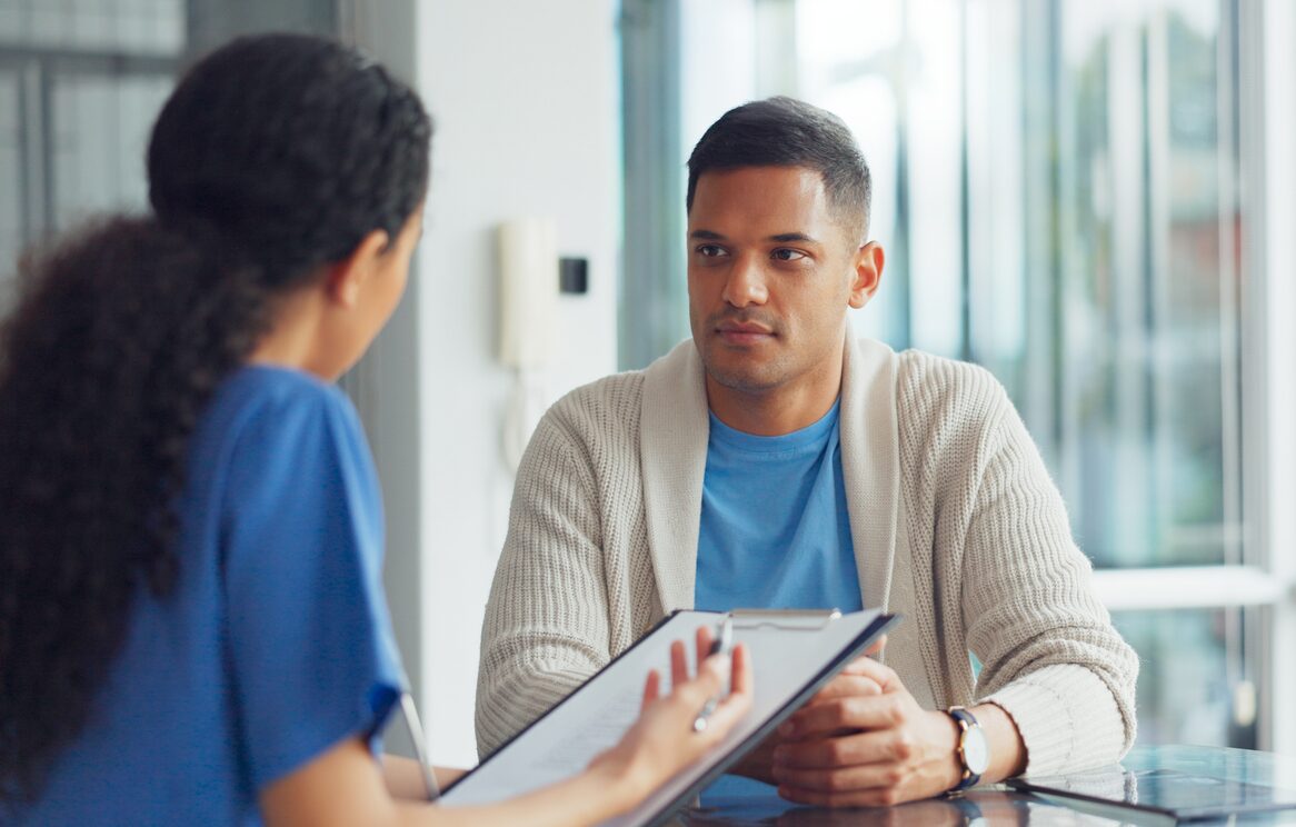 Doctor consulting a male patient