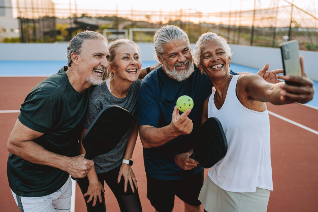 Pickleball players taking a selfie